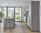 KUBE EasyTouch modern kitchen in Taupe Grey with large windows